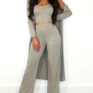 Matching cropped top pant set with matching shawl.